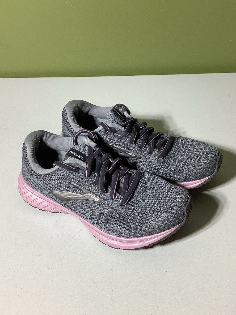Brooks Revel 3 gray and pink athletic shoes, size 6.5